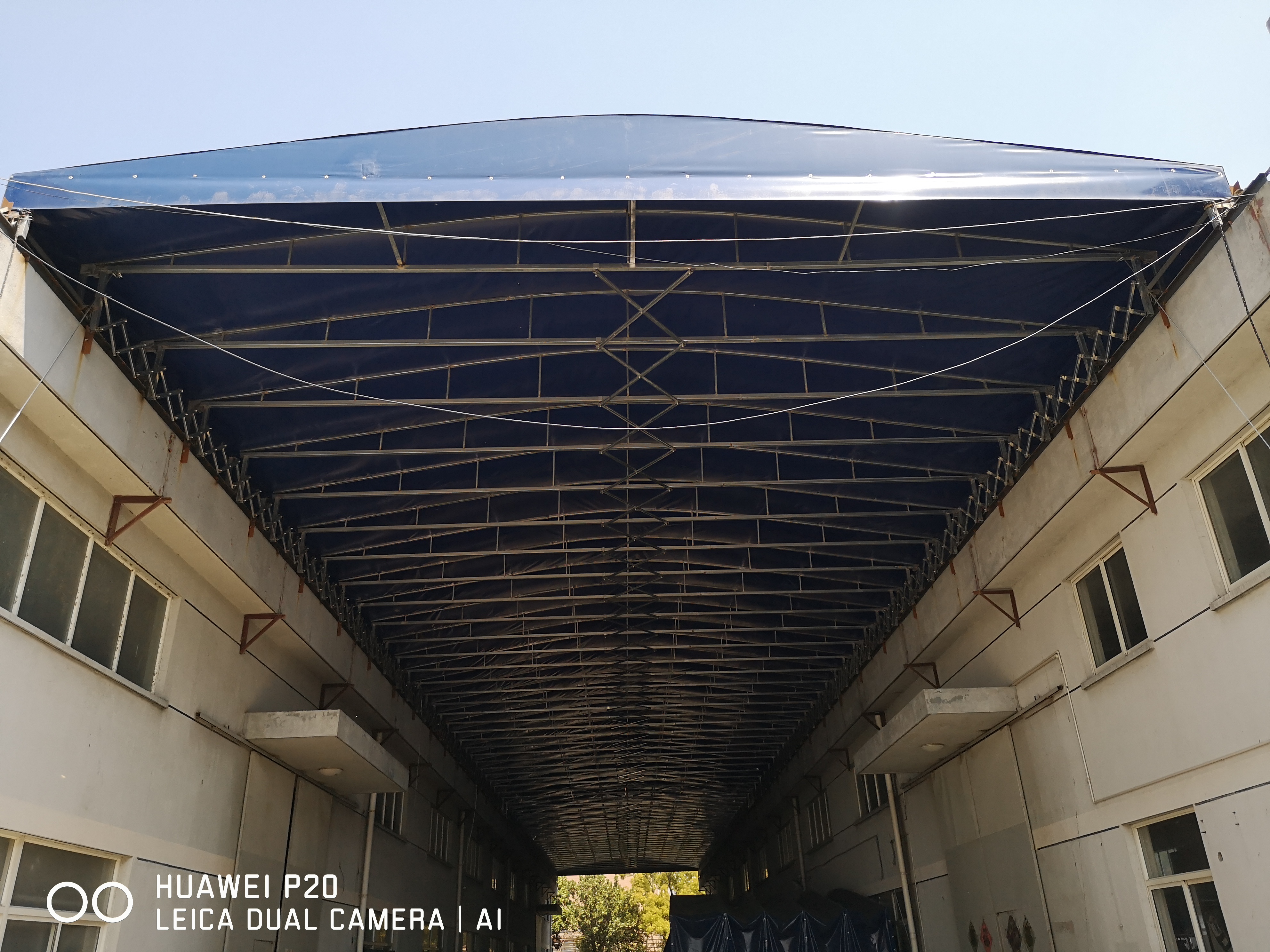 蘇州91网站遮陽材（cái）料有限公司—雨棚行（háng）業放心企業